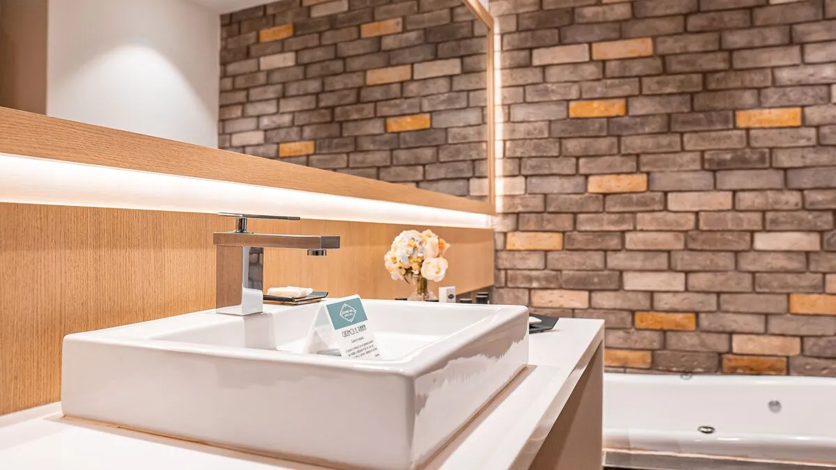 Jacuzzi dans la Suite avec Jacuzzi avec lit king size à l'Hôtel Punto MX.