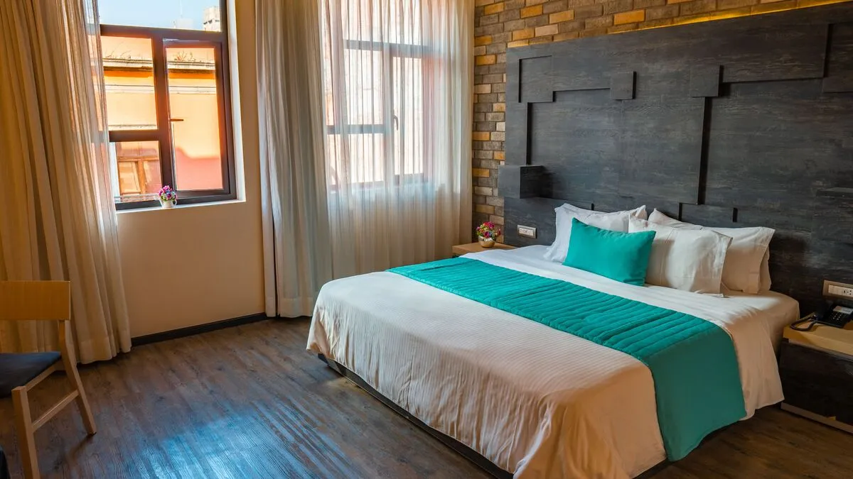 Suite avec Jacuzzi avec lit king size à l'Hôtel Punto MX.